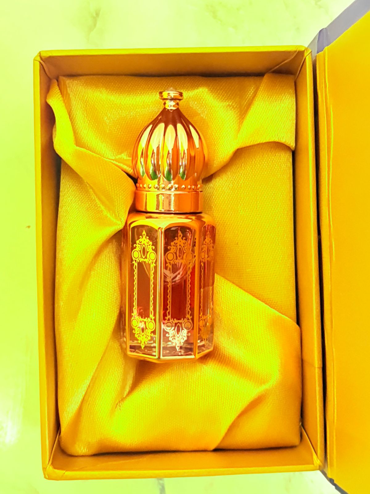 Gold D'PEARL attar bottle in box